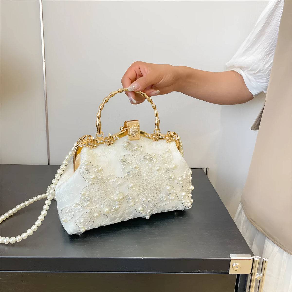 Pearl embroidered soft polyester handbag with double shoulder straps in floating light-white colour