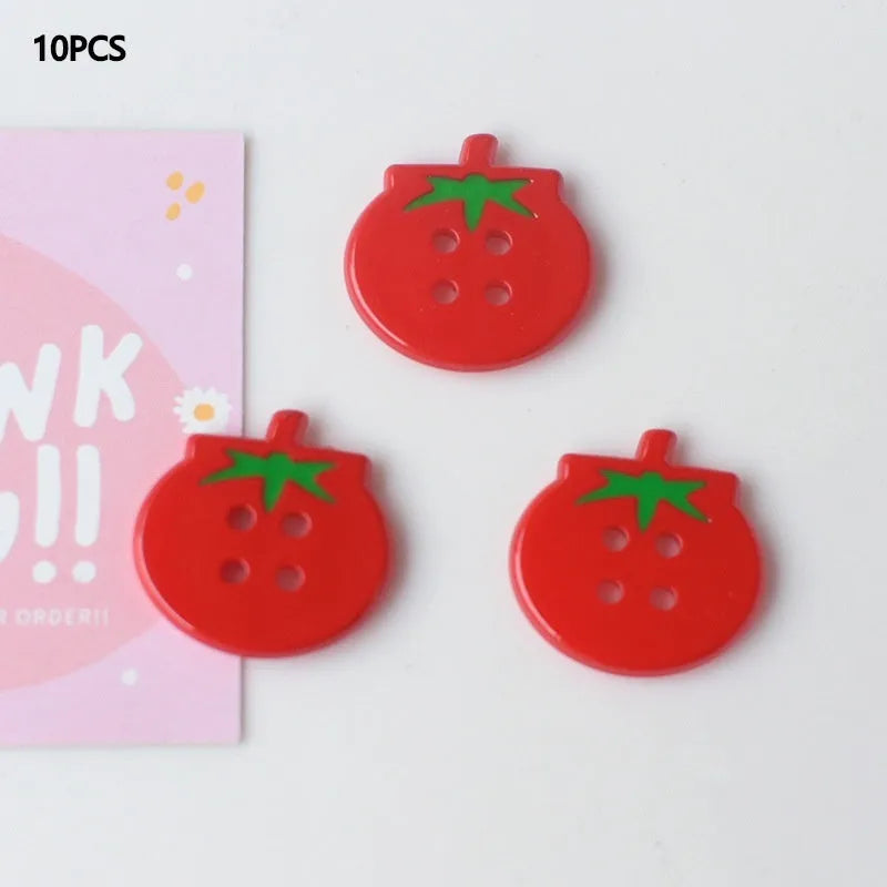 Plastic tomato button ornaments in cherry tomato printing, red plaid, solid red, and mixed colour designs