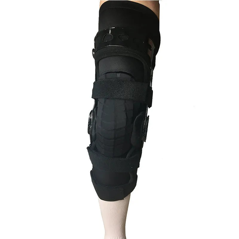 Black anterior ligament knee pad with iron stabilisers showing multi-layer construction