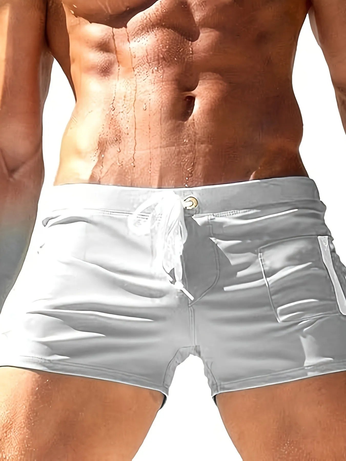 Men's black high-waist swimming trunks with a white lace-up closure on the front.