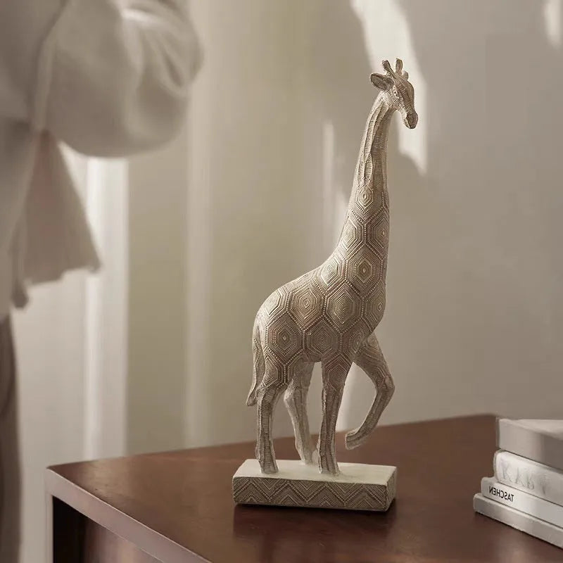 Wood colour giraffe resin ornament on a table, showing European style design and 30.5cm height.
