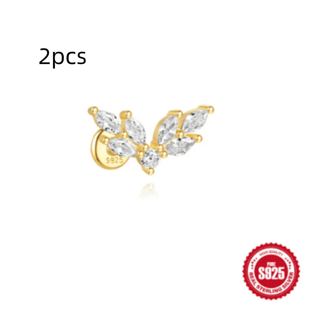 S925 sterling silver water drop shaped earrings with a flat spiral geometric design on a white background.