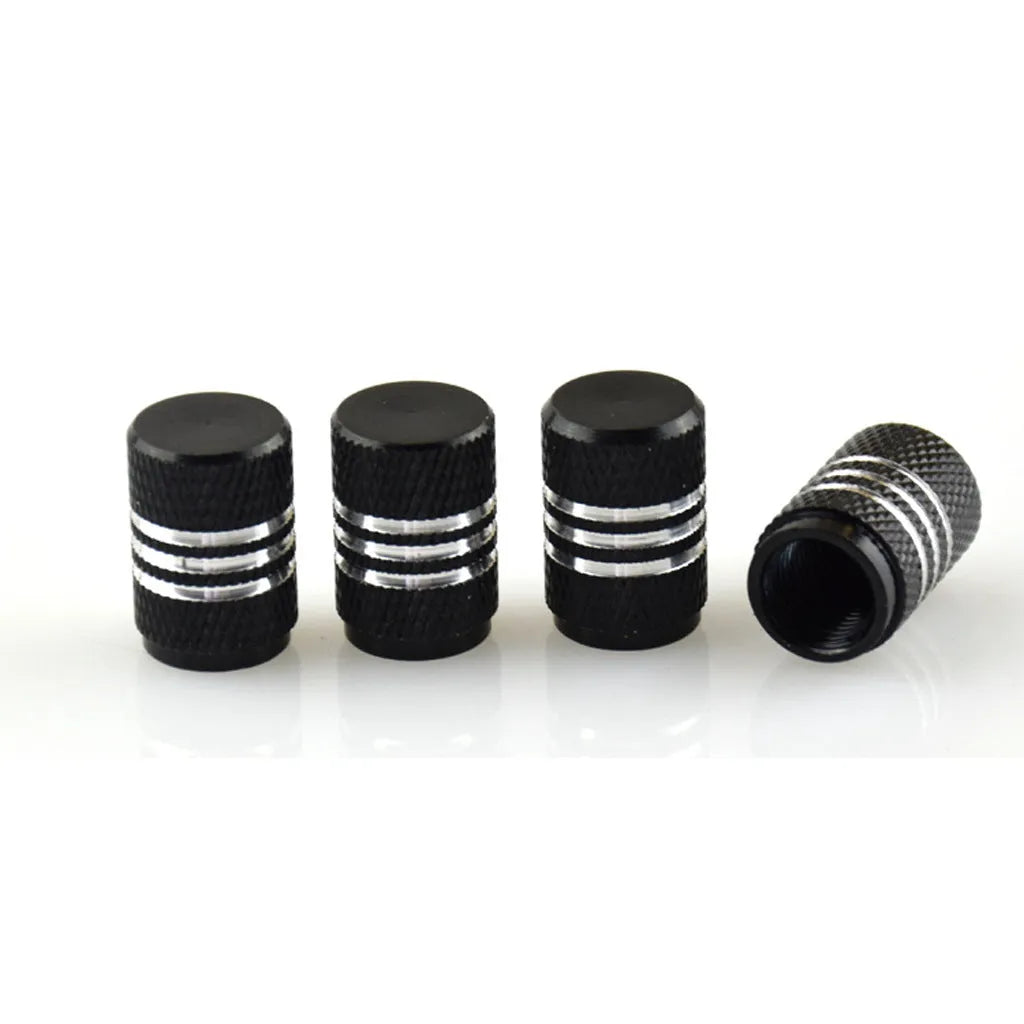 Set of stainless steel car tyre valve caps in assorted colours: black, red, blue, gold, silver, green, purple, sky blue, grey, orange.