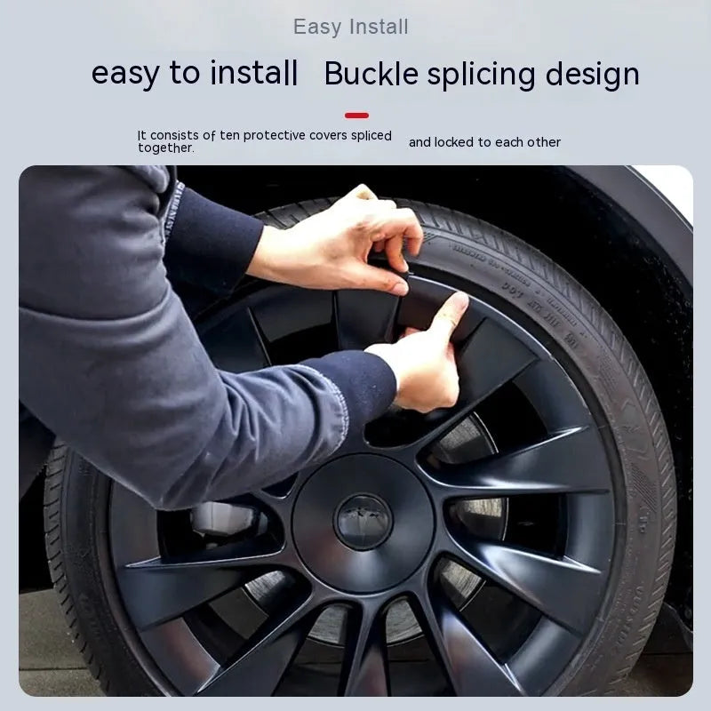 Tesla Model Y wheel hub cover with sectional steel ring design in black finish.