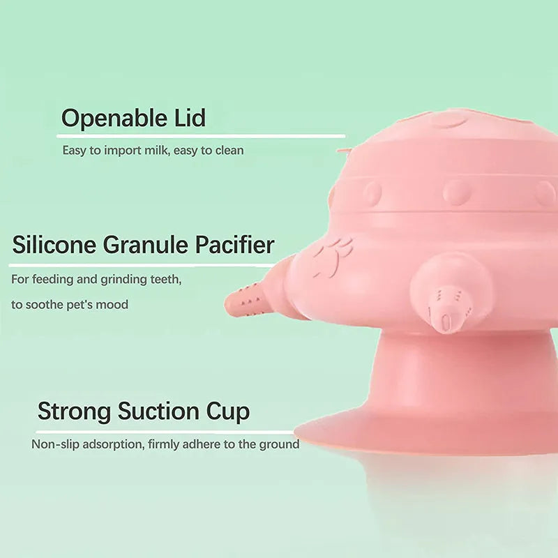 Pink silicone pet nursing bottle with bionic breast shape and four attached nipples on a flat base.