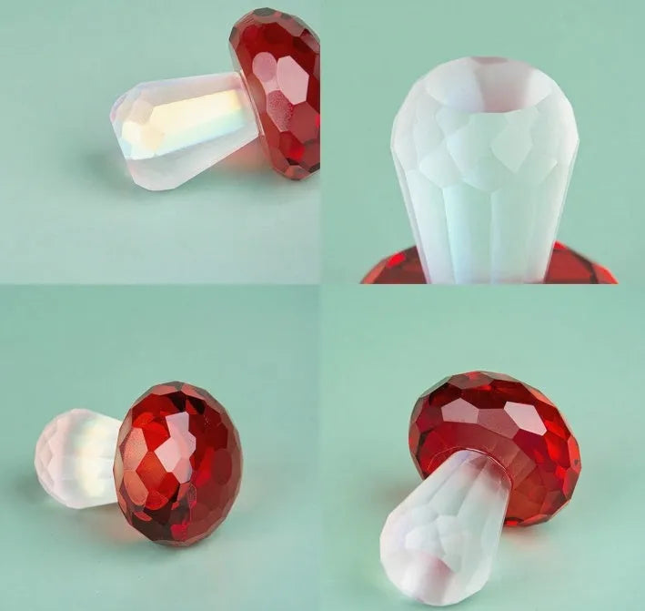Colourful transparent crystal mushroom decoration on a white background.