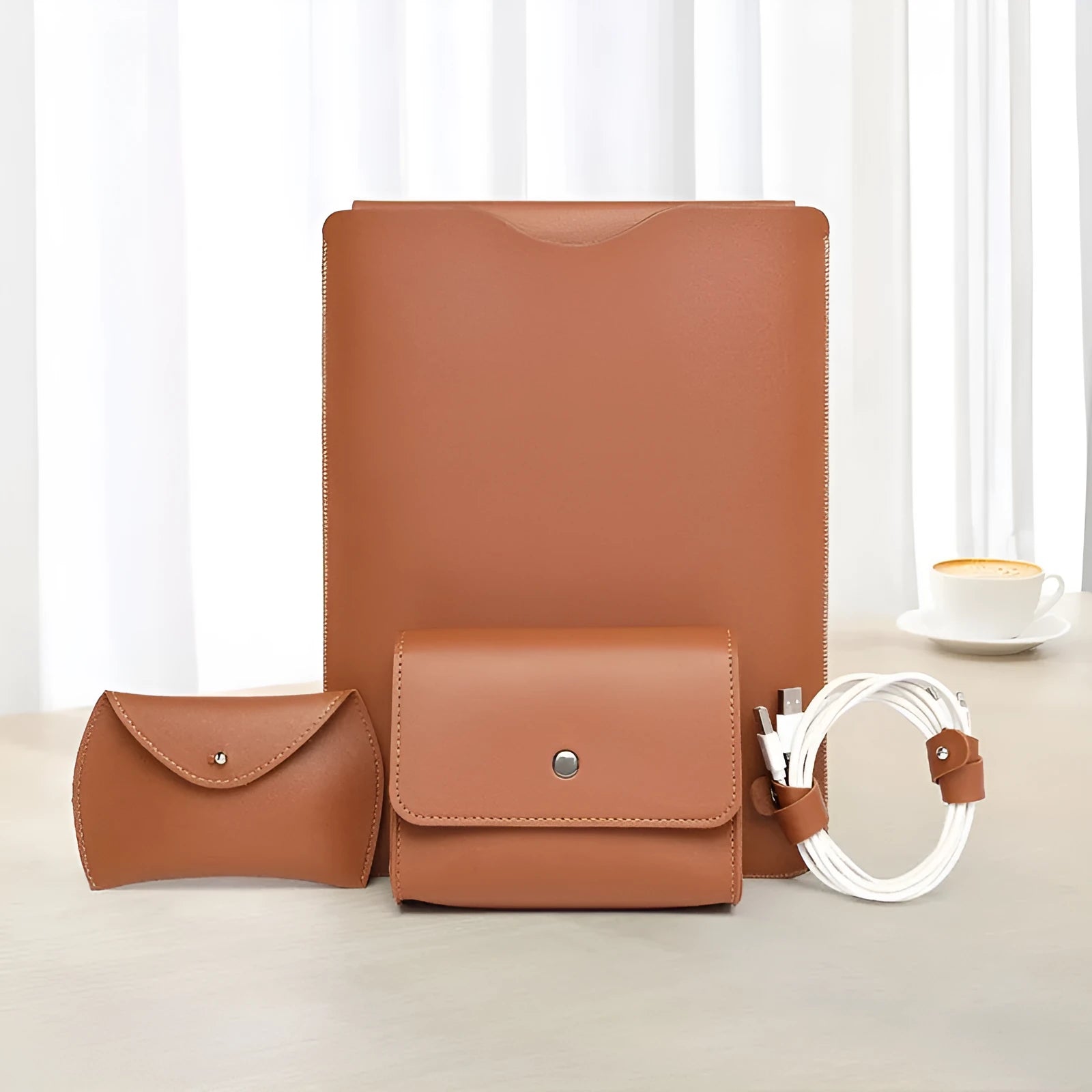 Set of four imitation leather laptop edge protector pieces in apricot, brown, gray and light pink.