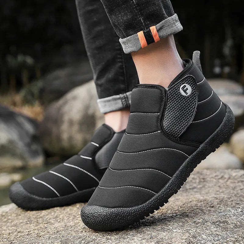 Men's waterproof snow boots in black with non-slip rubber soles and cotton upper