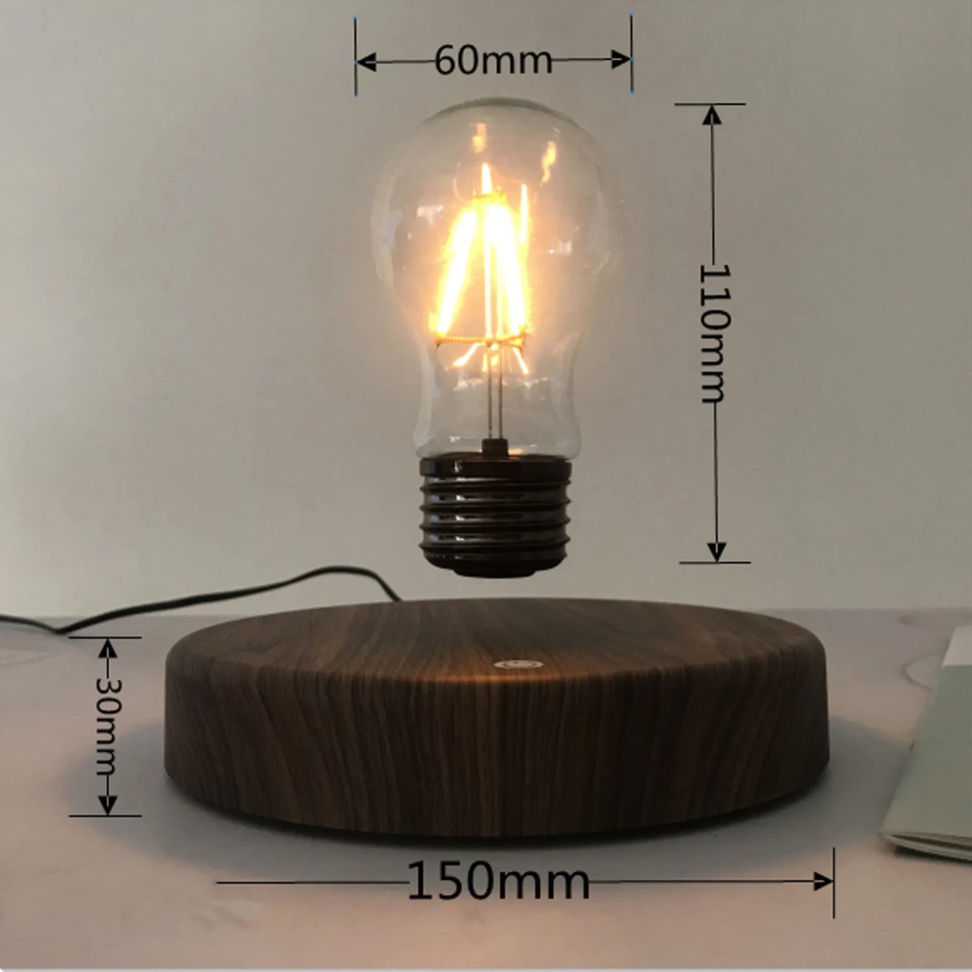 Magnetic levitation bulb night light in solid wood colour with floating bulb and plastic lamp holder