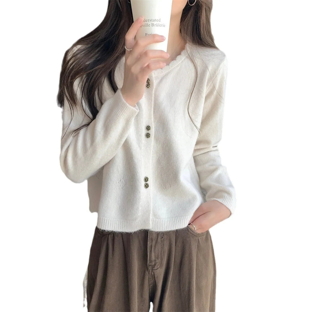 Women's long-sleeved acrylic cardigan coat in milky white, shown in a regular fit.