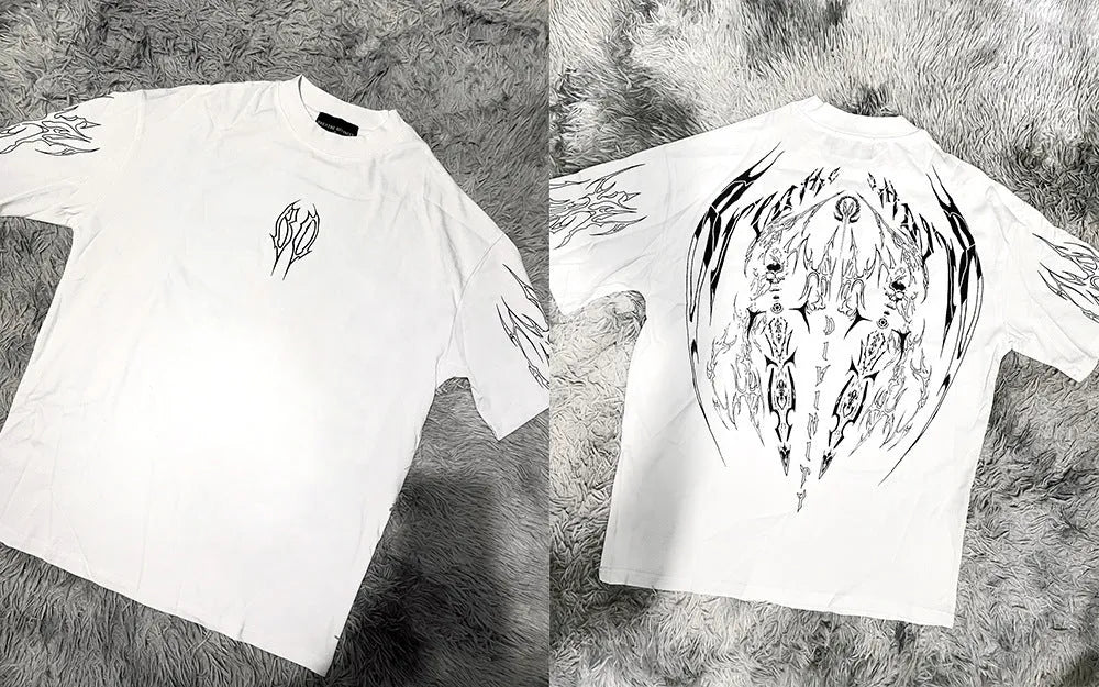 Loose fit dark coloured cotton T-shirt with short sleeves and gilding decorative detail.