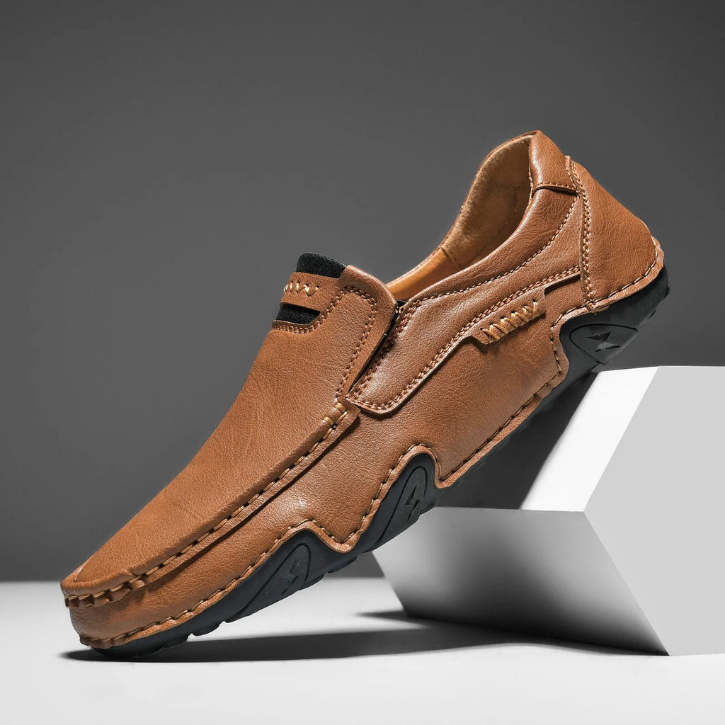 Men's flat casual slip-on loafers in microfiber with leather lining, shown in a choice of colours.