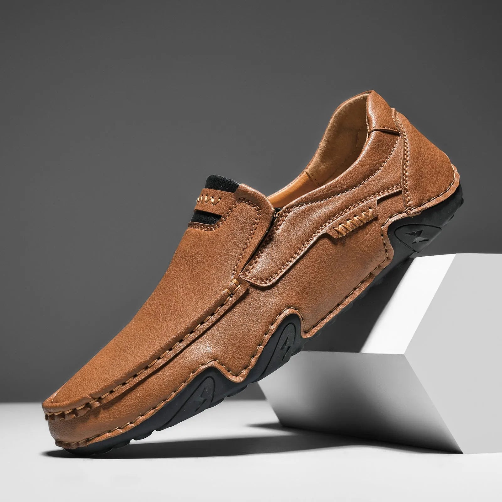 Men's flat casual slip-on loafers in microfiber with leather lining, shown in a choice of colours.