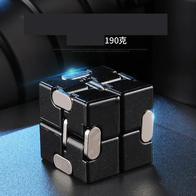 Black zinc alloy infinity cube fidget toy showing eight connected cubes.