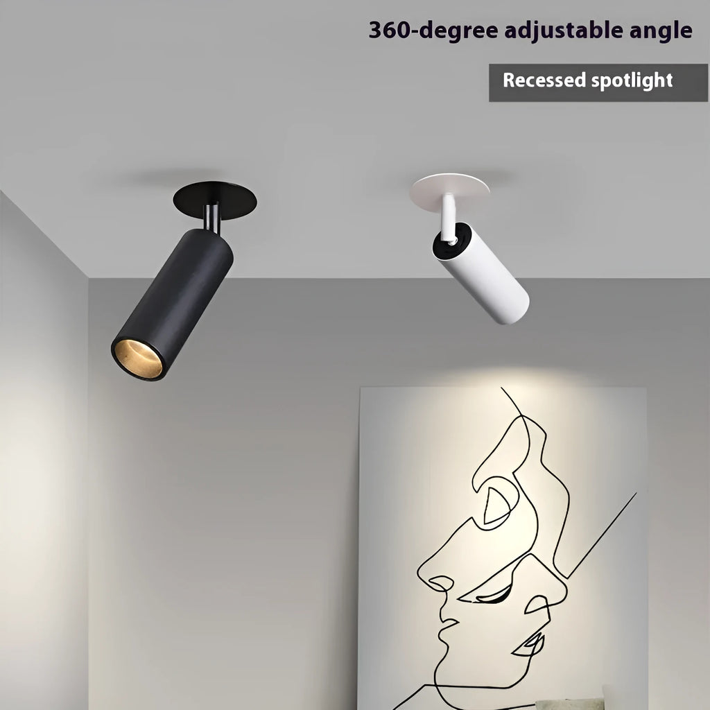 Black and white aluminium cylinder track spotlight for 55-75mm hole installation.