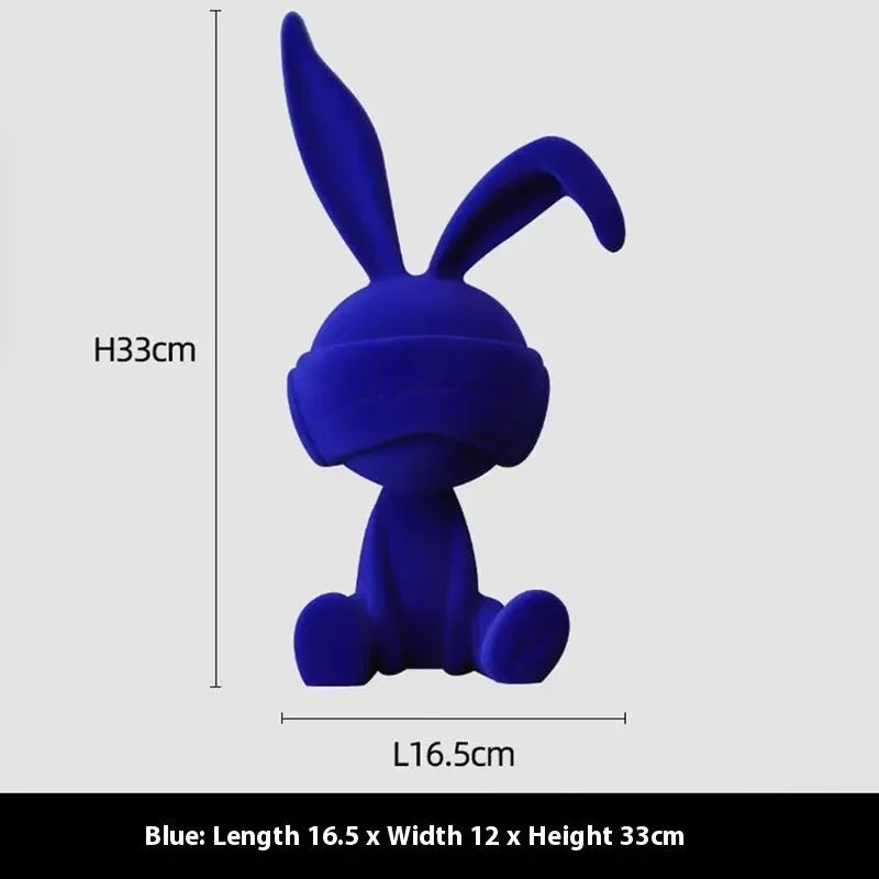 Resin rabbit table ornament with suede blindfold in green colour