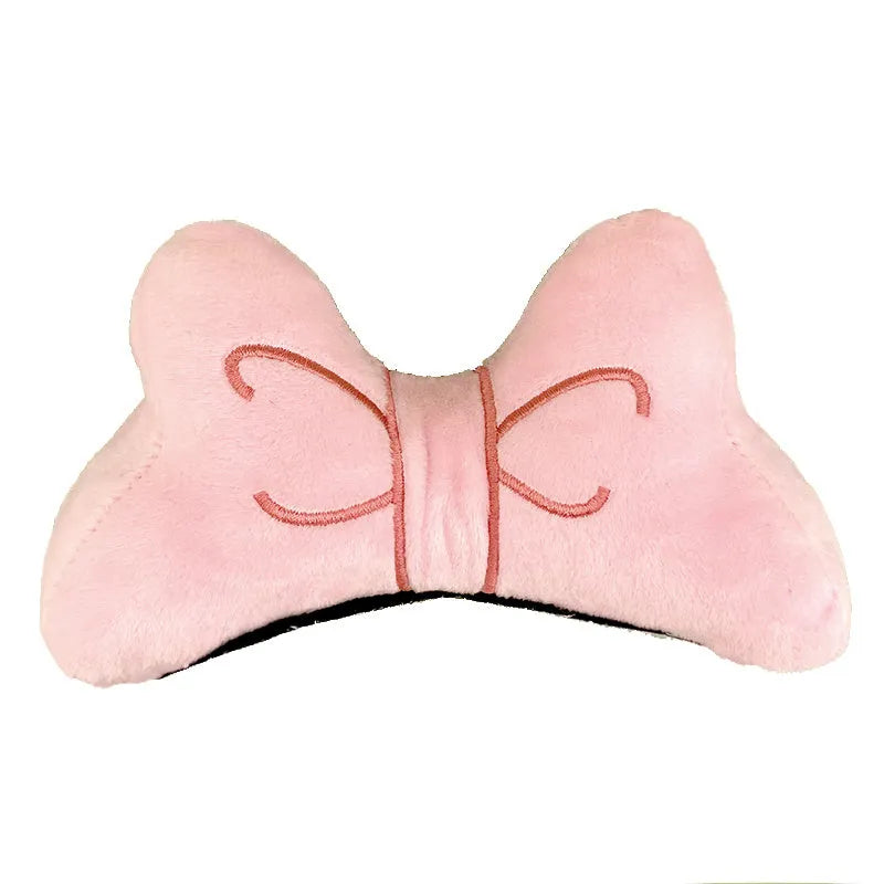Soft plush hair-tie bow decoration for helmets in red, peach pink and rose pink.