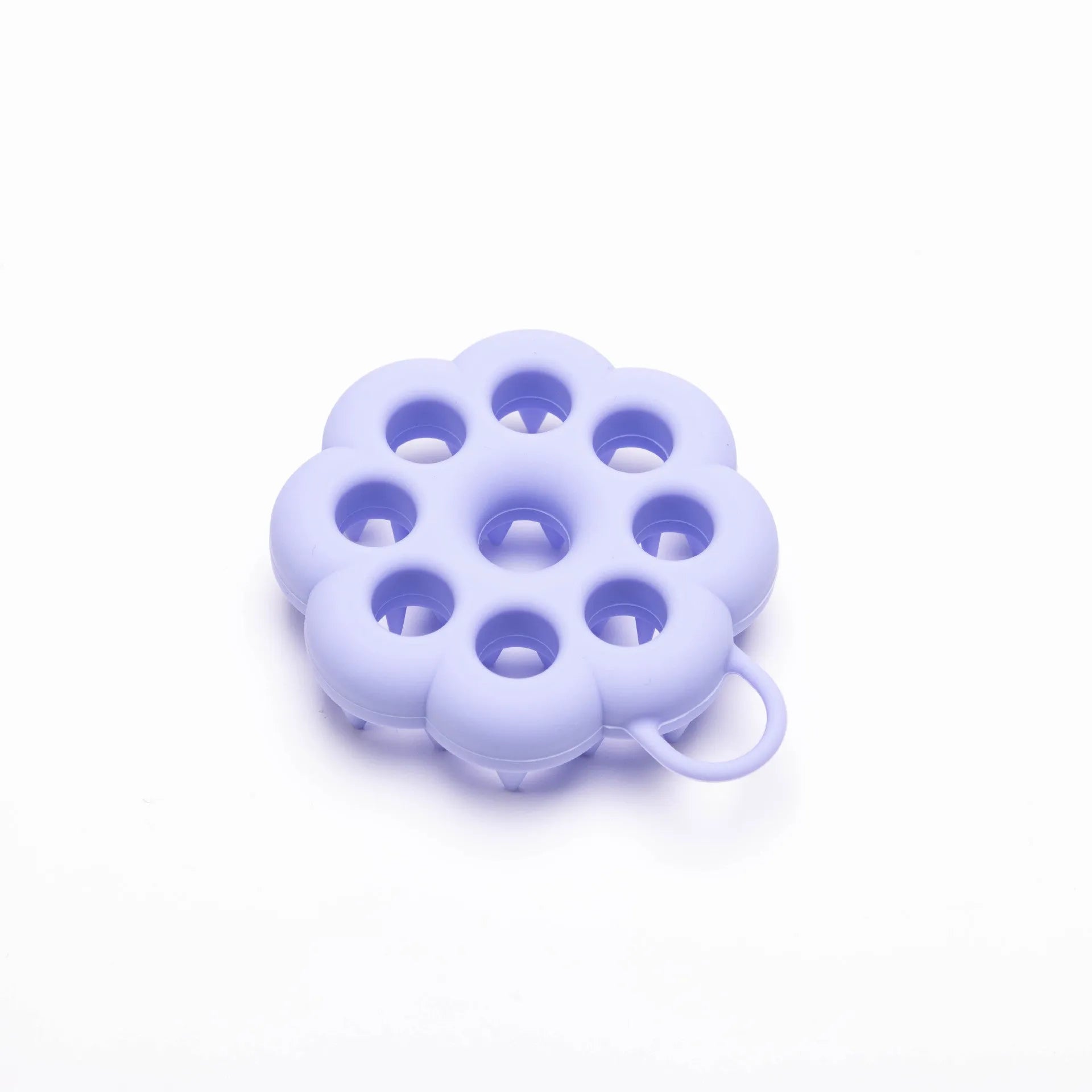 Blue silicone pet grooming brush with soft bristles and an ergonomic massage handle on a white background.