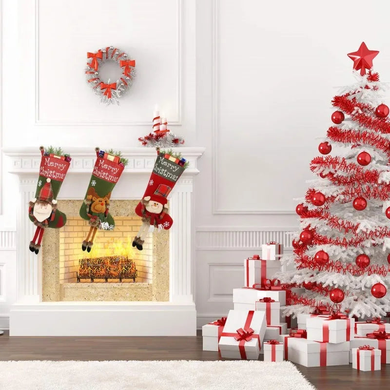 Three large Christmas stockings with Santa, Snowman and Reindeer 3D designs hanging for holiday decoration