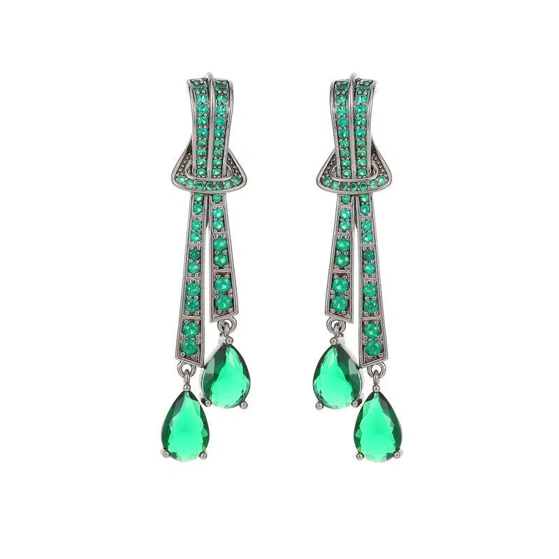 Knot drop earrings with silver needle post and zircon inlay in copper with electroplated finish, gold pearl colour