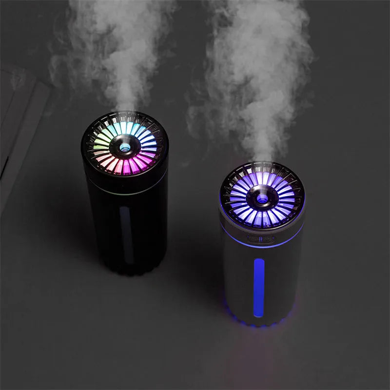Portable black USB humidifier with colourful lights on car cup holder