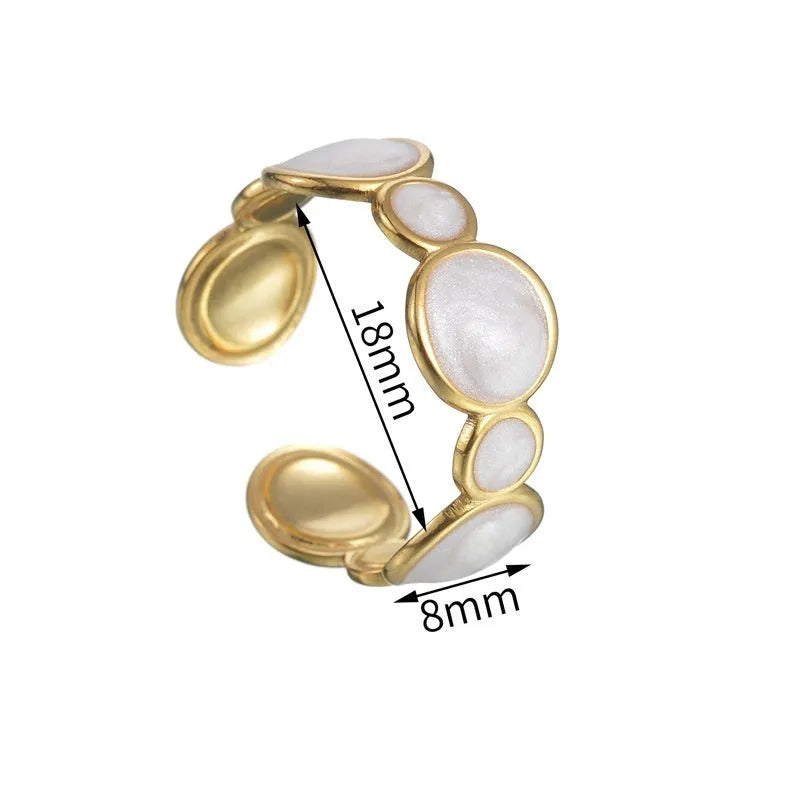 Geometric stainless steel ring with adjustable opening and electroplated metallic finish