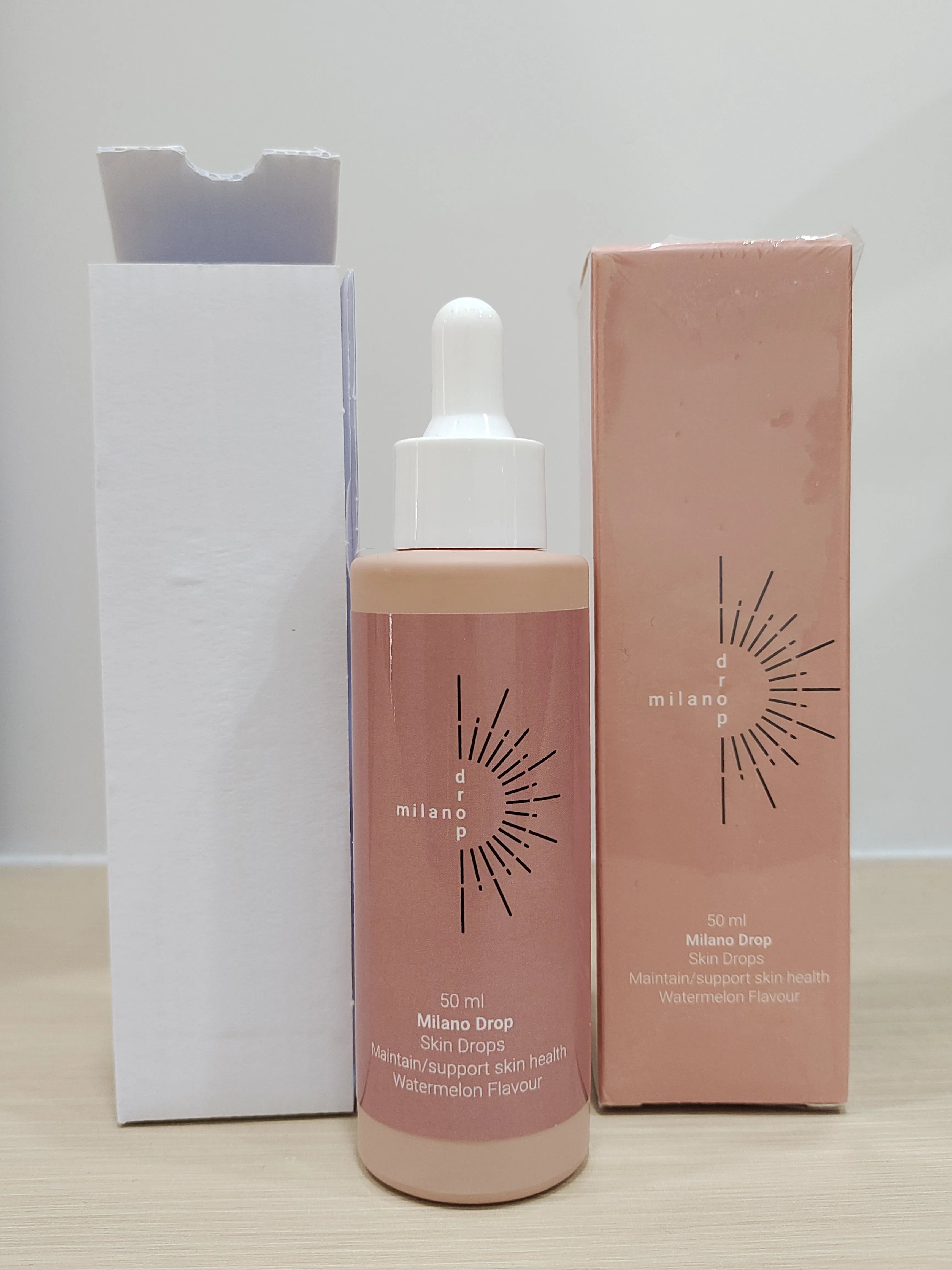 50ml tanning serum bottle with dark bronzer drops in mi lian colour box packaging