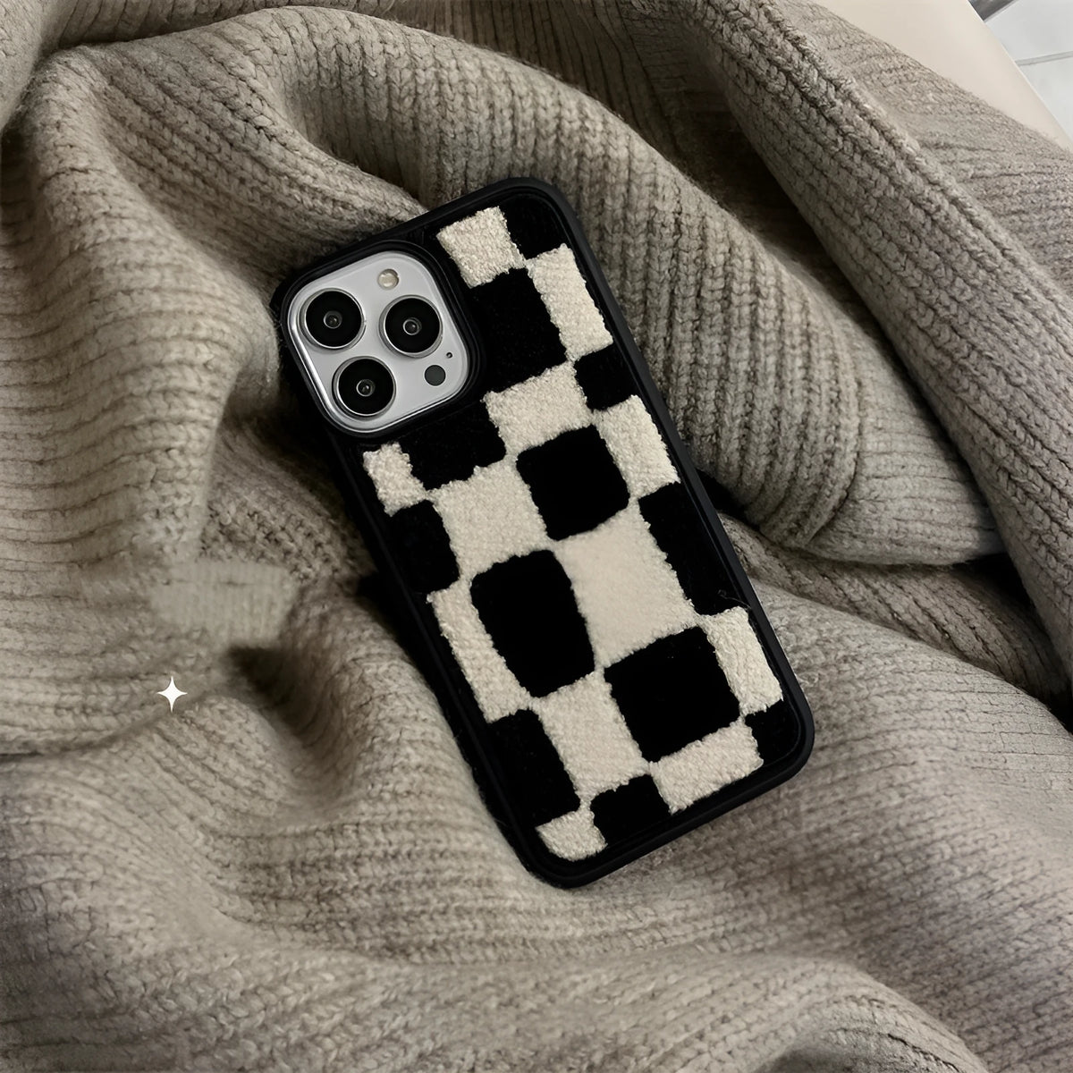 Black and white lattice silicone back cover for Apple iPhone models, including iPhone 14 and iPhone 13