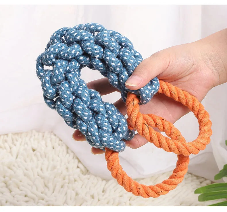 Blue double-ring braided cotton rope dog chew toy showing knot details and size against white background