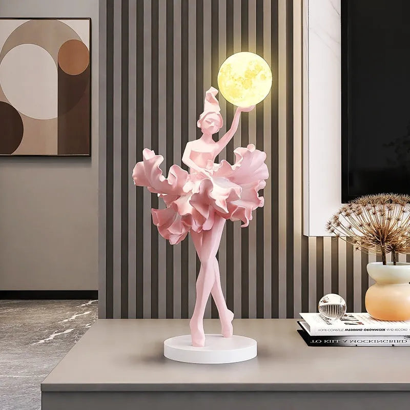 Ballet dancer resin night lamp in pink placed on a hallway table
