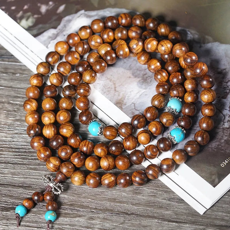 108 bead natural stone bracelet with hand-polished geometric lvzhu beads measuring 5-6mm diameter