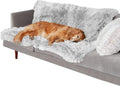 A plush dark grey waterproof dog cushion laid flat, showing its size and texture.