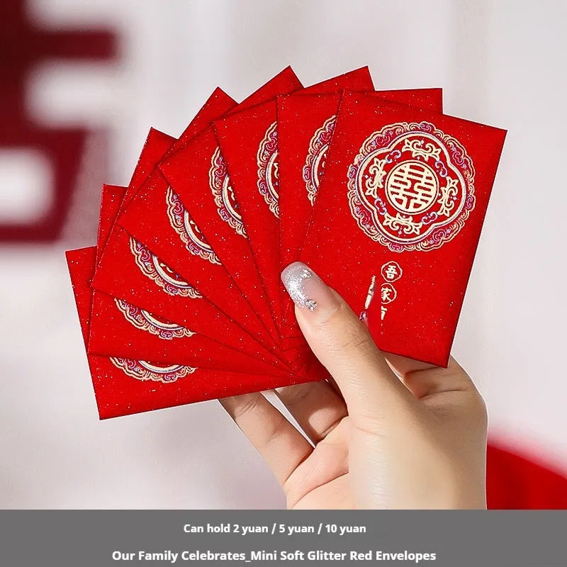 Pack of mini Chinese style wedding red packets in various colours for small cash gifts