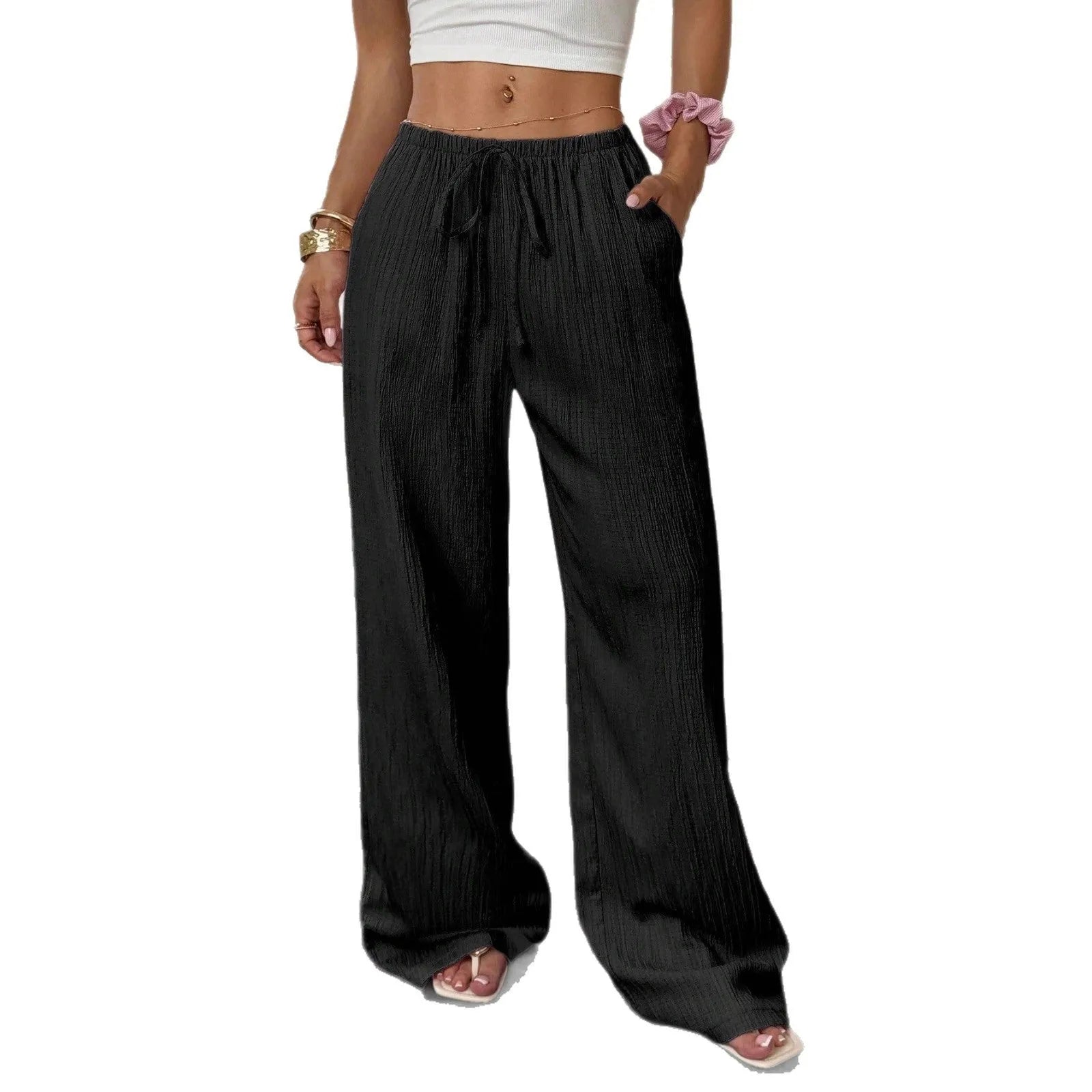 Women's black wide leg trousers with a front lace-up detail on the mid waist.