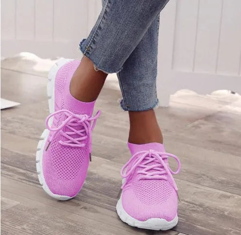 Women's lace-up platform sneakers in various colours with flat rubber soles