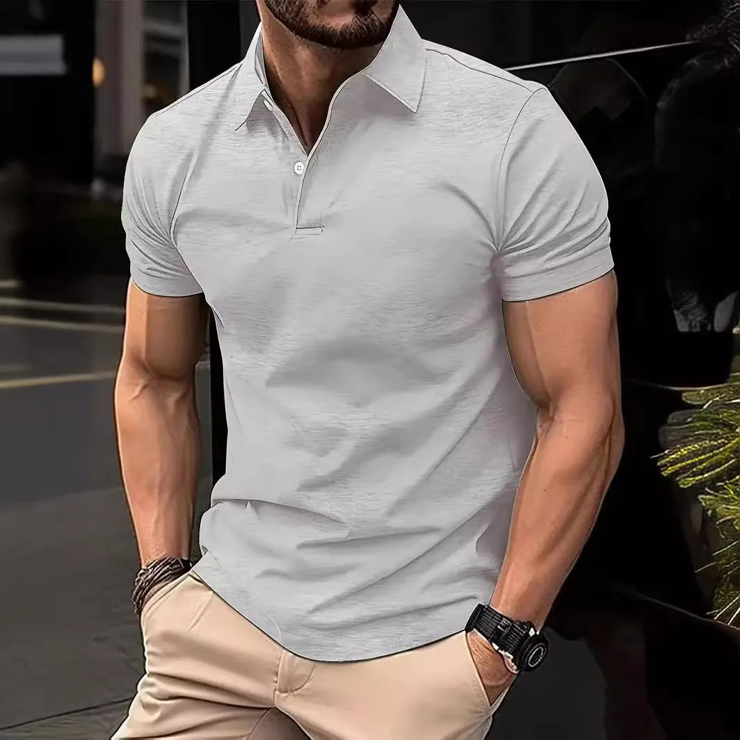 Man wearing a slim-fit solid colour short sleeve button-up casual shirt in a cotton blend fabric.