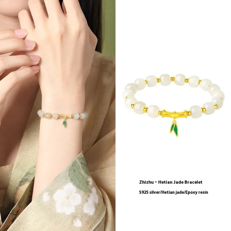 Women's S925 sterling silver and Hetian jade bracelet with bamboo leaf design.