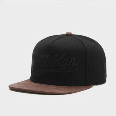 Adjustable cotton baseball cap with embroidered letters, dome top, short curved brim, in black and red for outdoor use