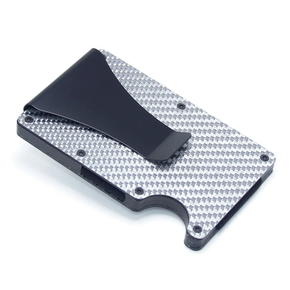 A slim carbon fibre card holder wallet in a geometric design, shown with business cards.