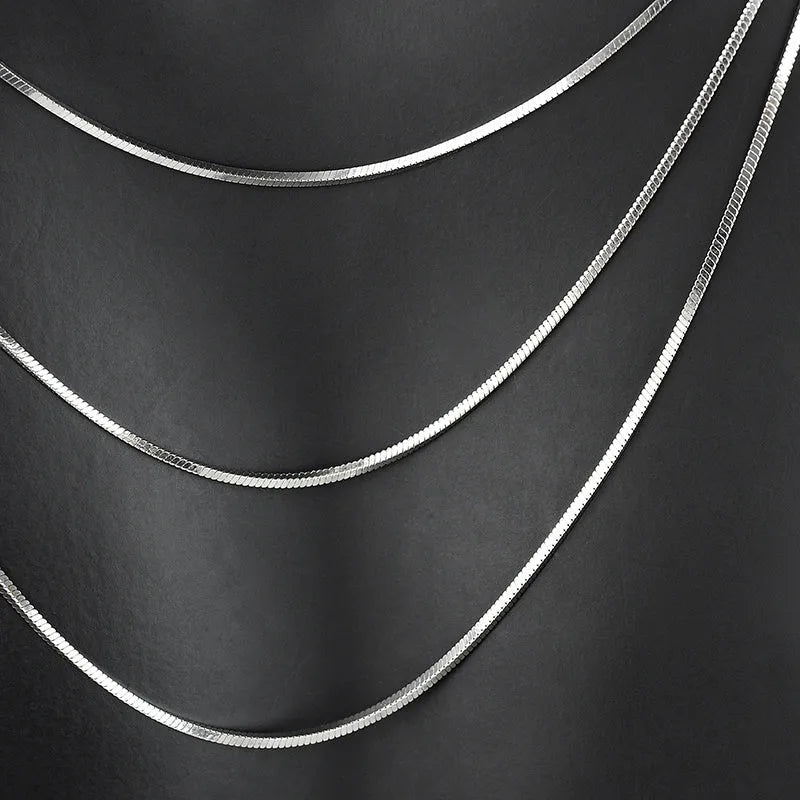 S925 sterling silver plated platinum snake bone chain necklace on display, silver colour, unisex design, 45-60cm length options