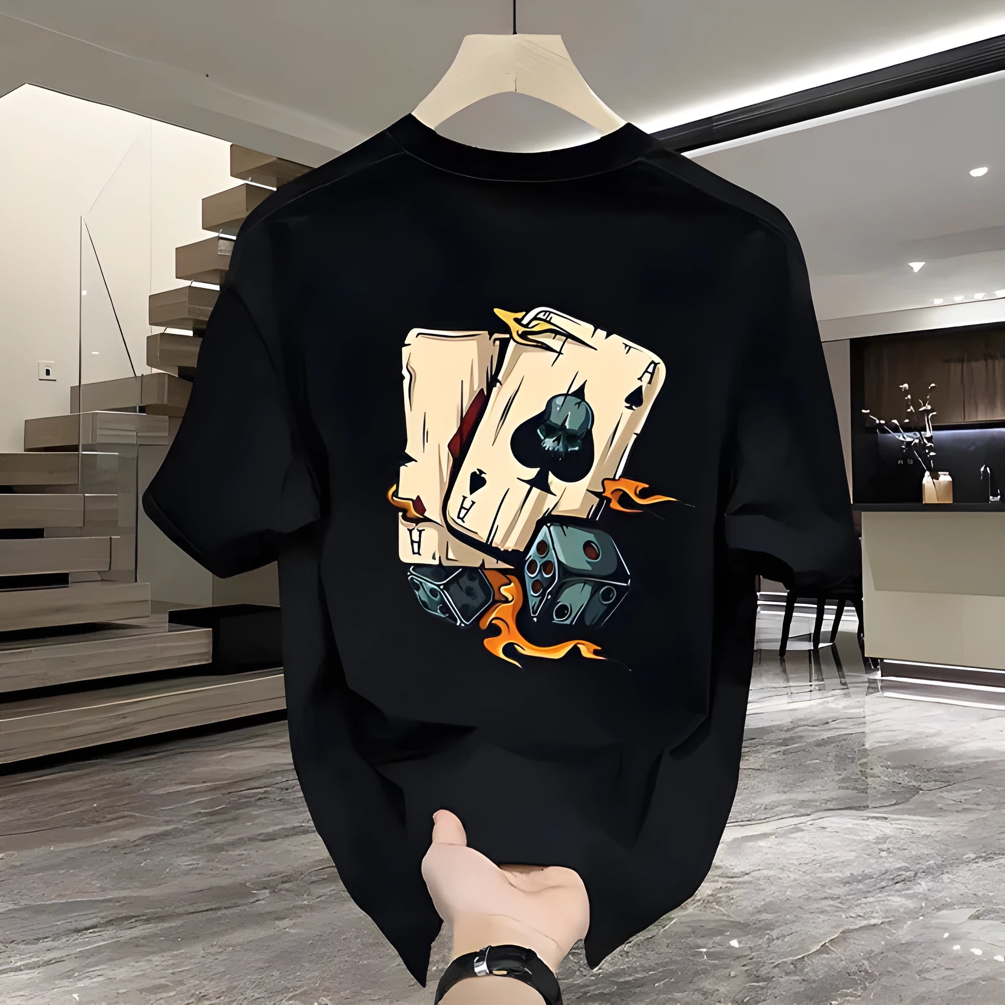 Man wearing a black printed short-sleeved cotton t-shirt, showcasing the front print design.