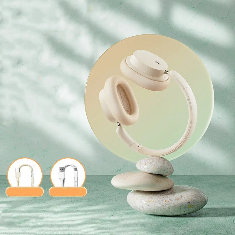 Beige or grey Bluetooth head-mounted earphones with Type-C charging port