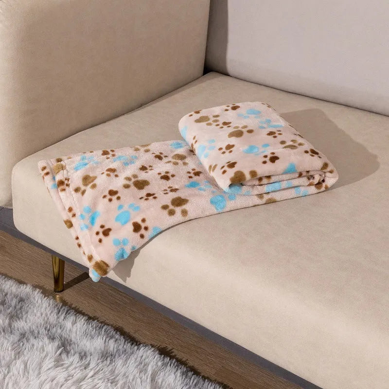 Blue Dog pattern double-sided flannel pet blanket folded to show size and cartoon design.