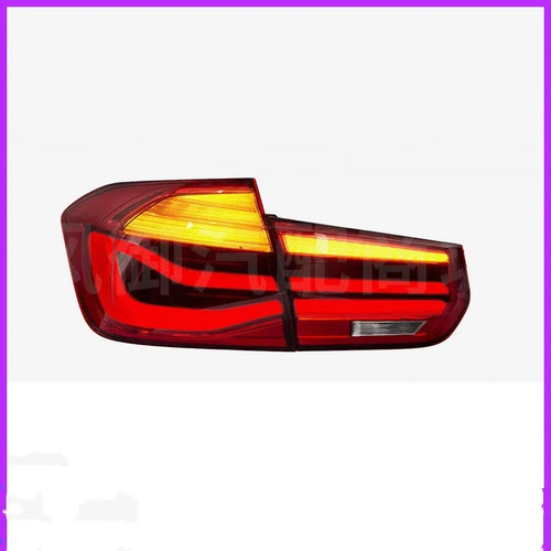BMW 3 Series E90 aftermarket LED tail light assembly in red and smoked black finish.
