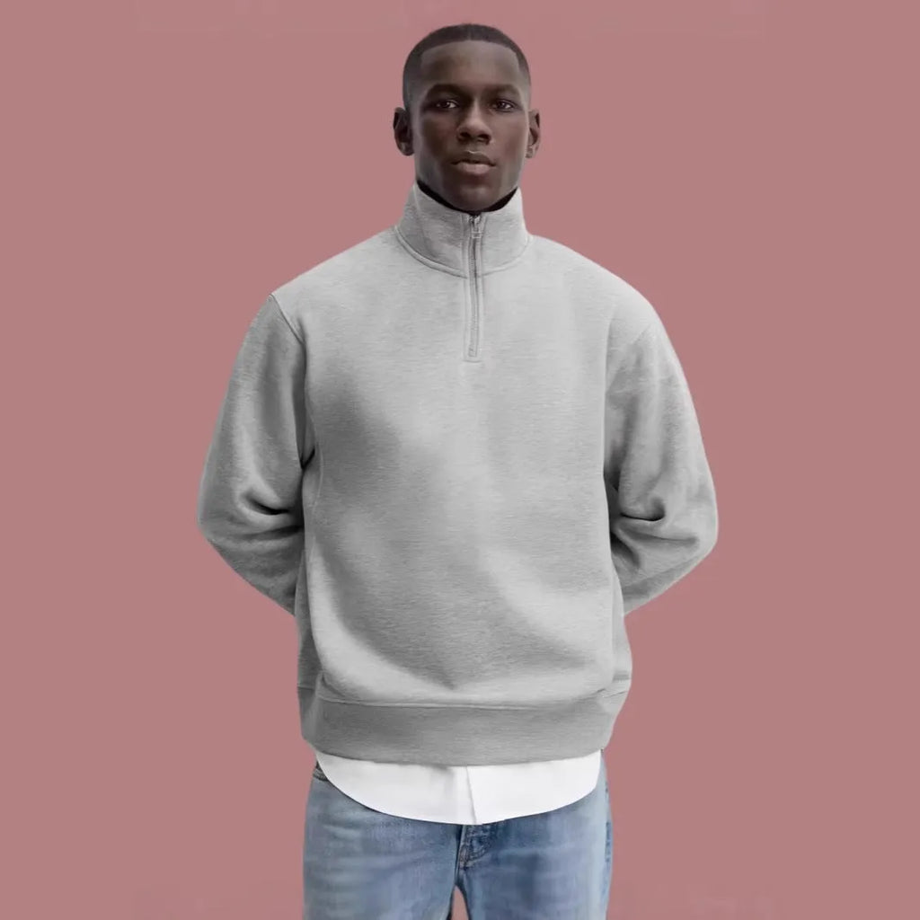 Grey unisex half-zip stand collar cotton sweater on a hanger.