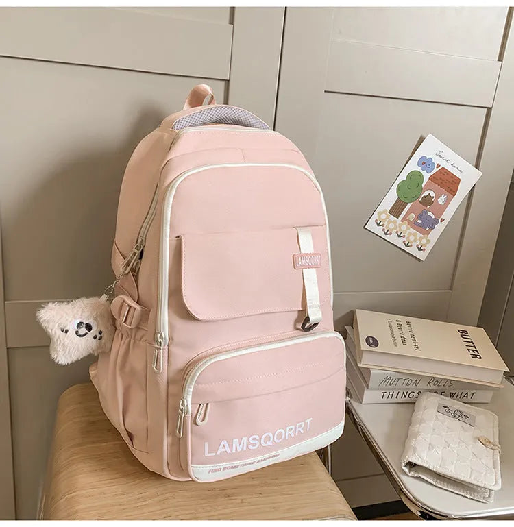 High school student backpack in waterproof nylon with curved shoulder straps and under 20L capacity