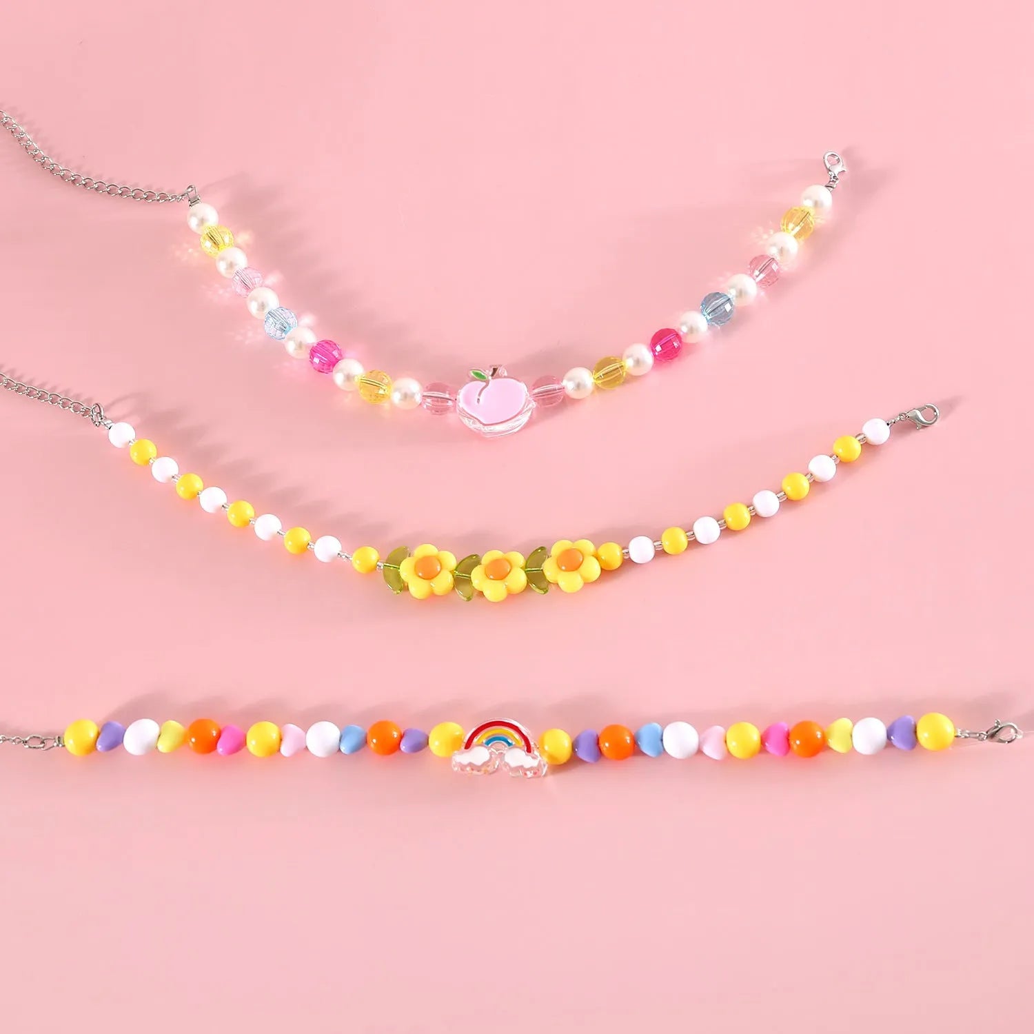Colourful plastic bead cat necklace with small flower pattern on adjustable cord