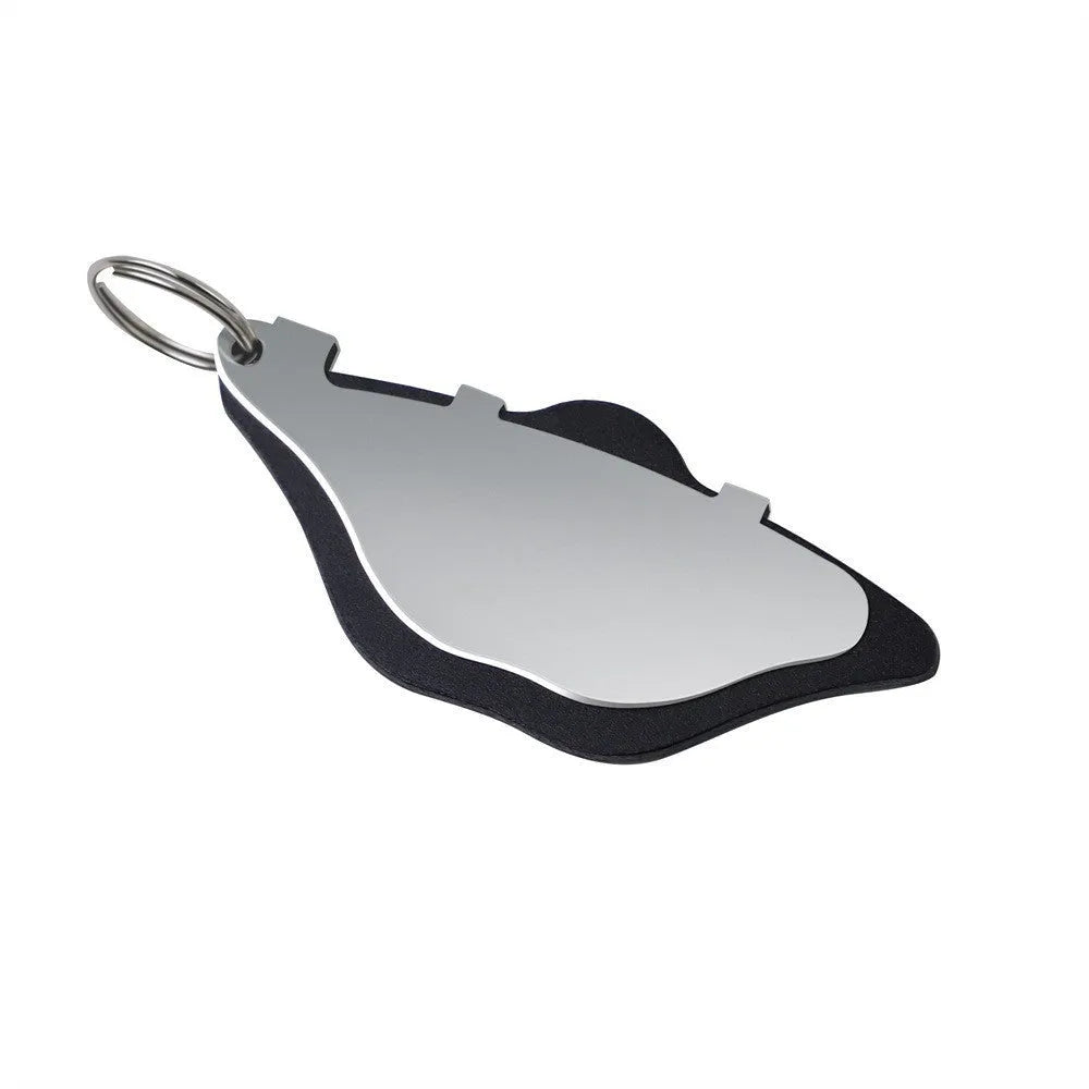 Black and orange mountain bike disc brake pads with a scratch-proof design.