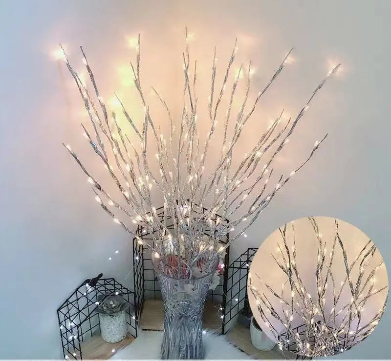 LED decorative tree light with silver artificial branches in vase base showing multiple colour options