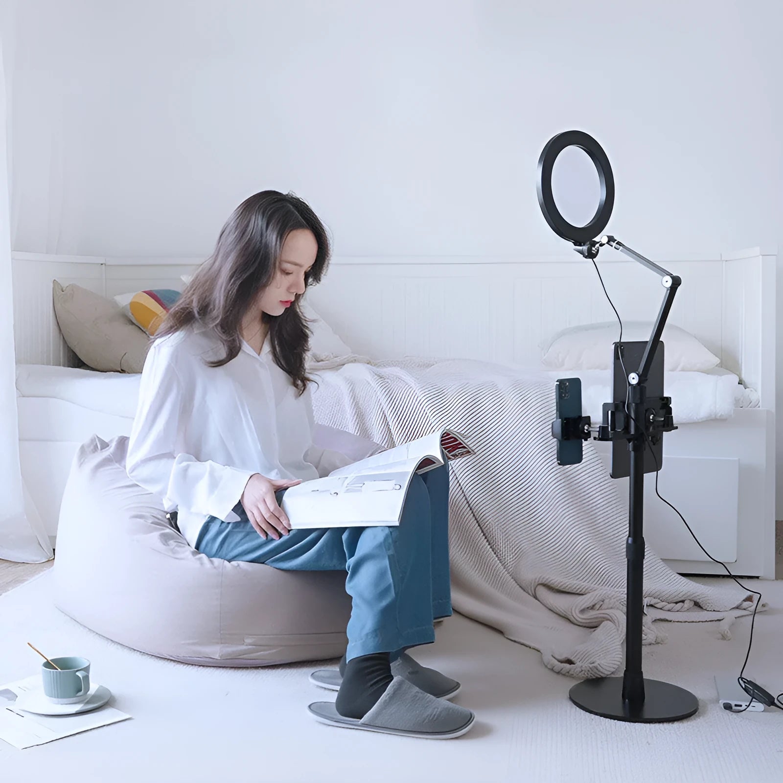 Black mobile phone tablet stand with fill light on floor for live broadcast filming